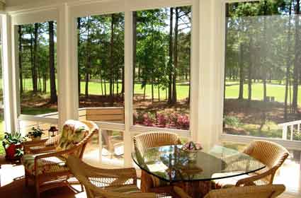 Outside view of a Screen Only Sunroom manufactured by The Sunroom Source