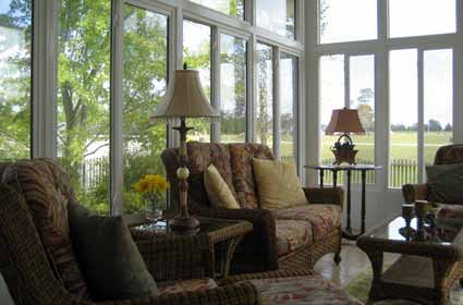 Inside view of a Hamptons Sunroom manufactured by The Sunroom Source